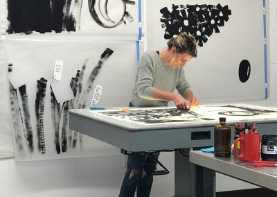 Apprentice Printer Alyssa Ebinger in the artist studio at Tamarind Institute, 2020
